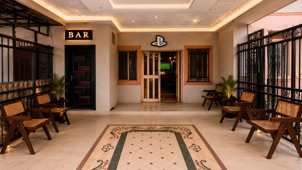 The entrance to Quarry Sports Bar inside Quarry Imperial Hotel — BAR sign over the door, screens visible inside
